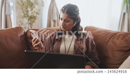 Thinking, woman and phone notification on sofa for entertainment, communication or internet browsing in home. Female person, thoughtful or concerned with laptop on couch for streaming or social media Thinking, woman and phone notification on sofa for entertainment, communication or internet browsing in home. Female person, thoughtful or concerned with laptop on couch for streaming or social media 143624916