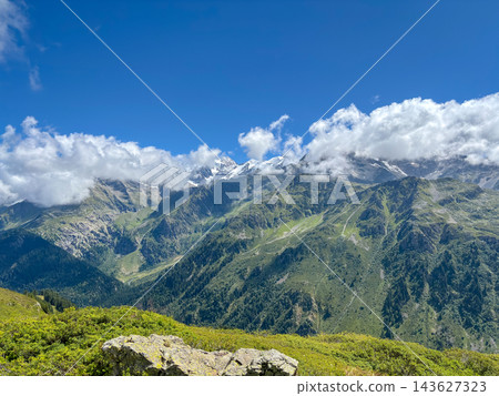 Clear summer view of Mont Blanc from alpine slopes, France 143627323