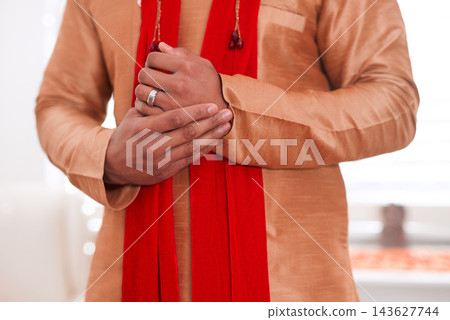 Indian, wedding and clothes for attire of person, culture and traditional in closeup and groom. Stylish, fashion and suit for man in morning for marriage, selection and accessory by tailor in Mumbai Indian, wedding and clothes for attire of person, culture and traditional in closeup and groom. Stylish, fashion and suit for man in morning for marriage, selection and accessory by tailor in Mumbai 143627744