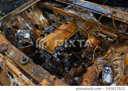 Burned Car Engine With Severe Fire Damage and Rust Burned Car Engine With Severe Fire Damage and Rust 143627823