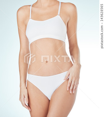 Underwear, woman and beauty in studio for health, wellness and self care with model aesthetic. Girl, lingerie and natural body with epilation or waxing for slimming transformation on white background Underwear, woman and beauty in studio for health, wellness and self care with model aesthetic. Girl, lingerie and natural body with epilation or waxing for slimming transformation on white background 143628565
