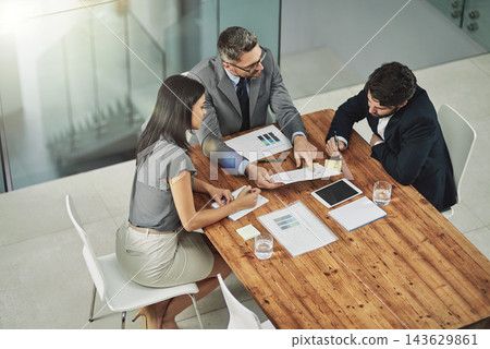 Meeting, discussion and business people with paperwork in office for review, budget report or project proposal. Lens flare, corporate consultant and staff for conversation, sales graph or teamwork Meeting, discussion and business people with paperwork in office for review, budget report or project proposal. Lens flare, corporate consultant and staff for conversation, sales graph or teamwork 143629861