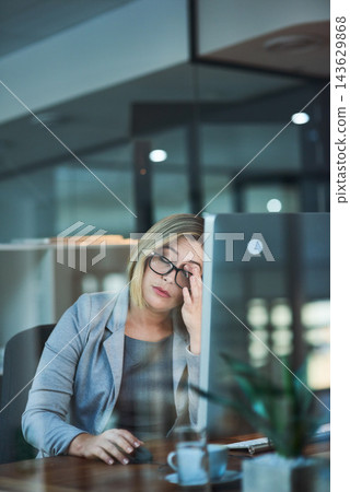 Tired woman, headache and night with computer in stress, anxiety or burnout at office. Frustrated female person or business employee working late with migraine, strain or depression at workplace Tired woman, headache and night with computer in stress, anxiety or burnout at office. Frustrated female person or business employee working late with migraine, strain or depression at workplace 143629868