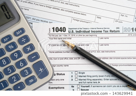 Tax form 1040 U.S. Individual Income Tax Return, business finance. Tax form 1040 U.S. Individual Income Tax Return, business finance. 143629941