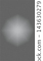 Dark spotlight background with an intentionally film-grain-like granular texture. 143630279