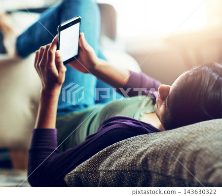 Woman, phone screen and lying on sofa with blank space for mockup, reading and app in living room. Girl, smartphone and streaming with ux for notification, video and relax on couch with social media 143630322