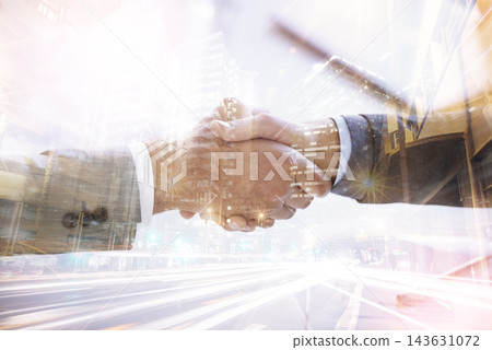 Business people, handshake and double exposure of city success with global networking or travel opportunity. Corporate worker or clients shaking hands with night deal or introduction in urban overlay Business people, handshake and double exposure of city success with global networking or travel opportunity. Corporate worker or clients shaking hands with night deal or introduction in urban overlay 143631072