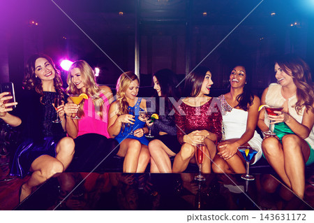 Women, selfie or friends in nightclub vip with drink, glass or cocktails for memory, event or reunion. Pictures, relax and happy people on dark party couch for alcohol, photo or social celebration Women, selfie or friends in nightclub vip with drink, glass or cocktails for memory, event or reunion. Pictures, relax and happy people on dark party couch for alcohol, photo or social celebration 143631172