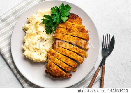 Crispy Chicken Schnitzel with mashed potato Crispy Chicken Schnitzel with mashed potato 143631613
