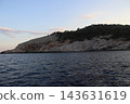 Wild Rocky Island with Limestone Cliffs in the Adriatic Sea at Sunset, Croatia 143631619
