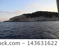 Rocky Uninhabited Island in Adriatic Sea at Sunset - Supetar Island near Cavtat Croatia 143631622