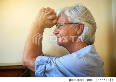 Thinking, praying or senior woman with hope in with memory, trauma or fear in living room alone. Stress, remember or nervous elderly lady with decision, anxiety or depression in retirement or house Thinking, praying or senior woman with hope in with memory, trauma or fear in living room alone. Stress, remember or nervous elderly lady with decision, anxiety or depression in retirement or house 143634813