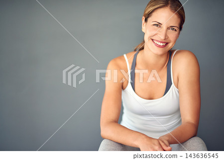 Portrait, smile and woman with fitness, progress and healthy person on grey studio background. Face, model and athlete with balance, mockup space and exercise with training, wellness and challenge Portrait, smile and woman with fitness, progress and healthy person on grey studio background. Face, model and athlete with balance, mockup space and exercise with training, wellness and challenge 143636545