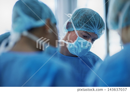 Team of surgeons in surgery, healthcare and surgical procedure start with PPE and group in theatre in hospital. Medical operation, health insurance and safety gear with specialist doctors in clinic Team of surgeons in surgery, healthcare and surgical procedure start with PPE and group in theatre in hospital. Medical operation, health insurance and safety gear with specialist doctors in clinic 143637037