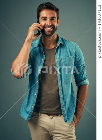 Phone call, smile and portrait of man in studio, cellphone and communication on gray background. Internet, online and conversation with happiness, laugh and technology for male person on smartphone Phone call, smile and portrait of man in studio, cellphone and communication on gray background. Internet, online and conversation with happiness, laugh and technology for male person on smartphone 143637112