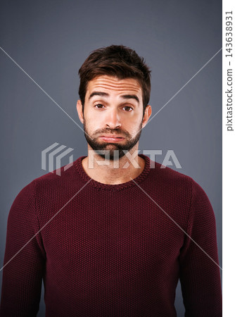Studio, portrait and stress of man, tired and burnout with depression and moody with exhaustion. Gray background, face and person with brain fog, sad and bored in New York and mental health for guy Studio, portrait and stress of man, tired and burnout with depression and moody with exhaustion. Gray background, face and person with brain fog, sad and bored in New York and mental health for guy 143638931