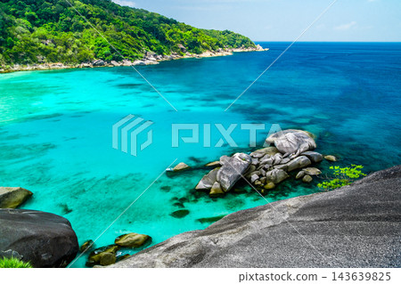 bay in sea near an island with blue water bay in sea near an island with blue water 143639825