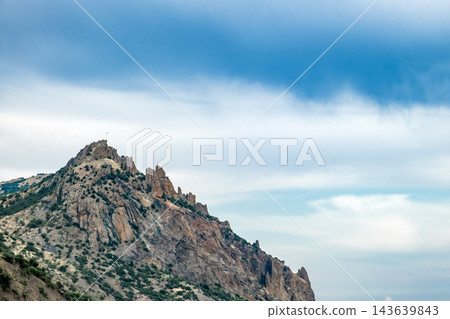 stone cliffs against the blue sky stone cliffs against the blue sky 143639843