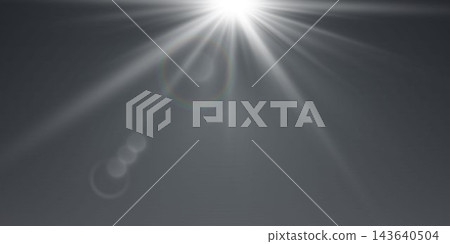Bright light rays and lens flare effect on dark grey background creating atmosphere Bright light rays and lens flare effect on dark grey background creating atmosphere 143640504