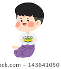 Thai Boy in Traditional Costume Holding Krathong for Loy Krathong Festival 143641050