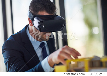 Business, man and vr for urban planning with future technology, vision and virtual reality as property developer. Entrepreneur, headset and real estate investment and user experience with building Business, man and vr for urban planning with future technology, vision and virtual reality as property developer. Entrepreneur, headset and real estate investment and user experience with building 143641250