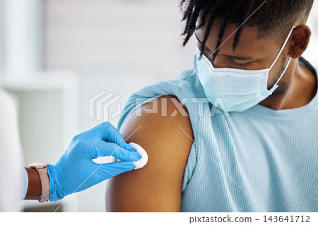Healthcare, man and doctor with cotton squab for vaccination, flu shot and medicine in hospital. Male person, patient and medical worker with pad for immunisation or booster injection preparation Healthcare, man and doctor with cotton squab for vaccination, flu shot and medicine in hospital. Male person, patient and medical worker with pad for immunisation or booster injection preparation 143641712