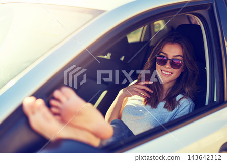 Woman, car and portrait by window in summer for travel, freedom and vacation with sunshine outdoor. Girl, legs and parking with motor as driver for road trip, holiday and adventure in San Francisco Woman, car and portrait by window in summer for travel, freedom and vacation with sunshine outdoor. Girl, legs and parking with motor as driver for road trip, holiday and adventure in San Francisco 143642312