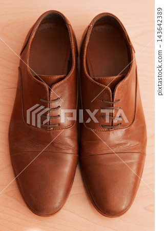 Fashion, wedding shoes and home with preparation, footwear and getting ready for formal event. Oxford style, dressing room and from above with fancy, luxury and classy brand with floor in house Fashion, wedding shoes and home with preparation, footwear and getting ready for formal event. Oxford style, dressing room and from above with fancy, luxury and classy brand with floor in house 143642389