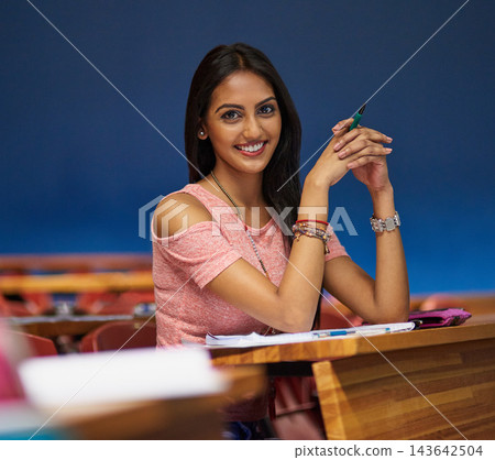 Woman, university student and happy in lecture hall on portrait for lesson, teaching and learning on campus. Female person, college and smile to study or revision for exams, test and assignment Woman, university student and happy in lecture hall on portrait for lesson, teaching and learning on campus. Female person, college and smile to study or revision for exams, test and assignment 143642504