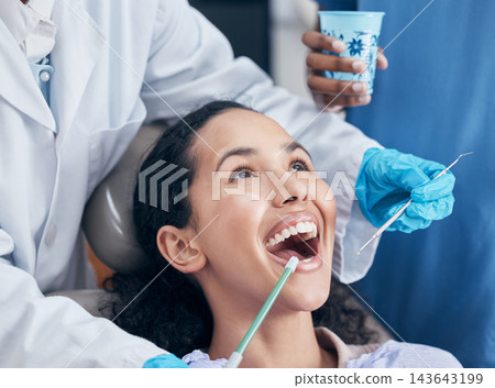 Checkup, woman and dentist with tools, cleaning and appointment for teeth whitening. People, fresh breath or medical with patient in chair, equipment or remove plaque with gum disease or oral hygiene Checkup, woman and dentist with tools, cleaning and appointment for teeth whitening. People, fresh breath or medical with patient in chair, equipment or remove plaque with gum disease or oral hygiene 143643199