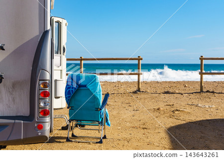 Rv motorhome camping on beach Rv motorhome camping on beach 143643261