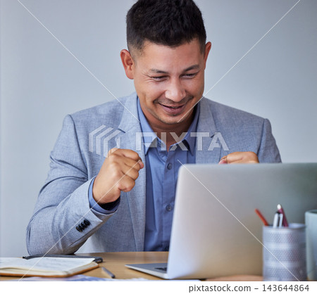 Corporate, laptop and fist of businessman in office for celebration, deal or success on project. Winner, technology and employee for achievement, good news or bonus notification at rental company 143644864
