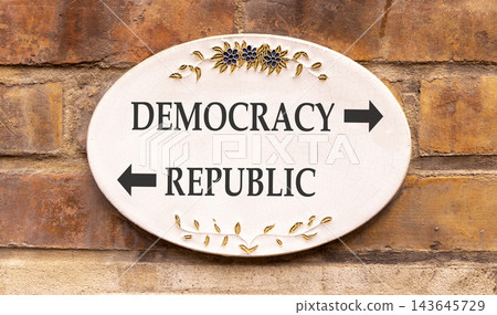Democracy or republic words symbol. Concept words Democracy Republic on beautiful white sign plate. Beautiful brick wall background. Business democracy republic concept. Copy space Democracy or republic words symbol. Concept words Democracy Republic on beautiful white sign plate. Beautiful brick wall background. Business democracy republic concept. Copy space 143645729