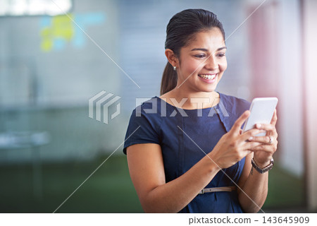 Business, woman and smile with phone or typing for text message, communication or social media scroll in office. Professional, employee or happy with smartphone for mobile chat notification on mockup Business, woman and smile with phone or typing for text message, communication or social media scroll in office. Professional, employee or happy with smartphone for mobile chat notification on mockup 143645909