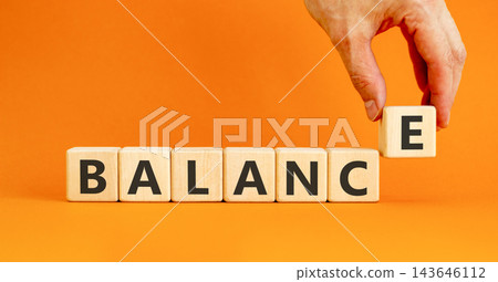 Balance word symbol. Concept word Balance on beautiful wooden blocks. Beautiful orange table orange background. Doctor hand. Business medical balance word concept. Copy space. Balance word symbol. Concept word Balance on beautiful wooden blocks. Beautiful orange table orange background. Doctor hand. Business medical balance word concept. Copy space. 143646112