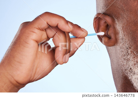 Studio, man and hand with cotton swab for cosmetics, self care maintenance and removal of wax. Mature person, product and ear with bud for hygiene, health and cleaning of dirt on white background Studio, man and hand with cotton swab for cosmetics, self care maintenance and removal of wax. Mature person, product and ear with bud for hygiene, health and cleaning of dirt on white background 143646778