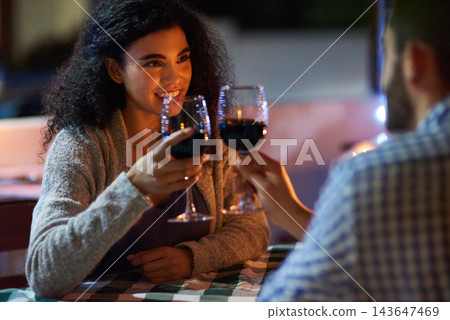 Toast, date and couple with love, smile and marriage with happiness, celebration and restaurant. People, red wine and man with woman, dinner or trust with alcohol, romance and relationship with care 143647469