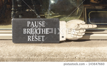 Pause breathe reset symbol. Concept words Pause breathe reset on beautiful black information sign. Beautiful shopfront background. Business support motivational pause breathe reset concept. Copy space 143647660