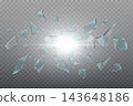 Broken glass shards flying outwards from a bright light explosion on transparent background 143648186