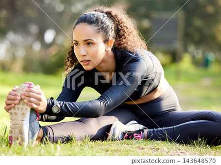 Fitness, nature and woman stretching leg on floor for running challenge, marathon training or morning cardio. Runner, warm up and athlete getting ready for workout, exercise or sport activity in park 143648570