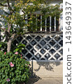 A Japanese-style house with blooming flowers 143649337