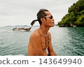 Thai man traveling watching ocean from boat 143649940