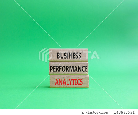 Business performance analytics symbol. Concept word Business performance analytics on wooden blocks. Beautiful green background. Business and Business performance analytics. Copy space Business performance analytics symbol. Concept word Business performance analytics on wooden blocks. Beautiful green background. Business and Business performance analytics. Copy space 143653551