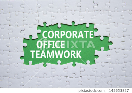Corporate Office Teamwork symbol. White puzzle with words Corporate Office Teamwork. Beautiful green background. Business concept. Copy space. 143653827