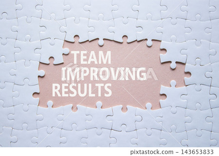 Team Improving Results symbol. White puzzle with words Team Improving Results. Beautiful pink background. Business concept. Copy space. Team Improving Results symbol. White puzzle with words Team Improving Results. Beautiful pink background. Business concept. Copy space. 143653833
