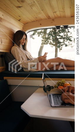 Couple living van life, working remotely and traveling Couple living van life, working remotely and traveling 143656107