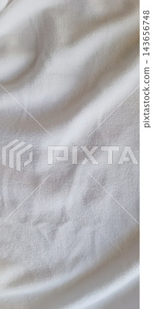 Soft plush folds over white fleece textile background blanket material Soft plush folds over white fleece textile background blanket material 143656748