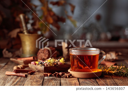Herbal tea with cinnamon, anise, and dried herbs. 143656807