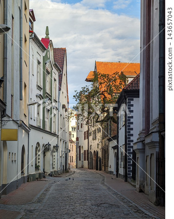 Old town historical view on ancient Alksnaja street in Riga Latvia Old town historical view on ancient Alksnaja street in Riga Latvia 143657043