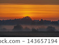 Fields covered in fog in Kernave, Lithuania 143657194